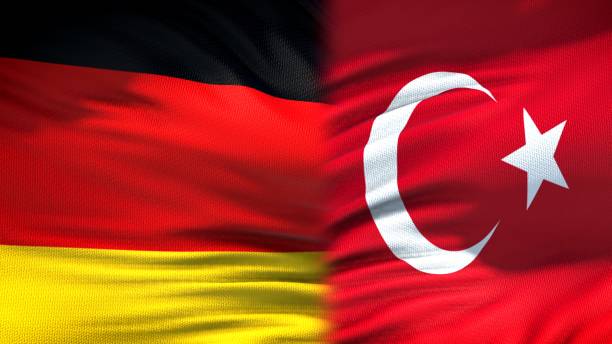 istock Germany and Turkey flags background, diplomatic and economic relations 1097603520
