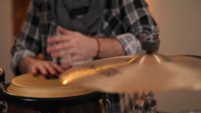 Musician Playing on Drums