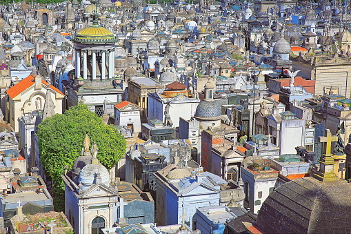 Above Buenos Aires Recoleta cemetery, capital of Argentina – South America\n\nLa Recoleta Cemetery (Spanish: Cementerio de la Recoleta) is a PUBLIC cemetery (belongs to the city of Buenos Aires), located in the Recoleta neighbourhood of Buenos Aires, Argentina. \n\nIn 2011, the BBC hailed it as one of the world's best cemeteries, and in 2013, CNN listed it among the 10 most beautiful cemeteries in the world.
