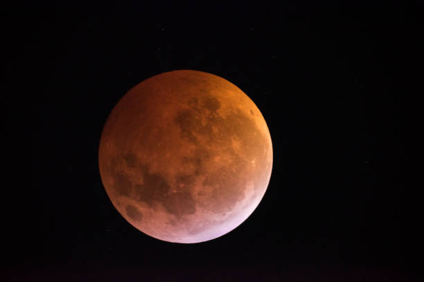 istock View of the Lunar eclipse trough a telescope from Buenos Aires, Argentina. 1097618868