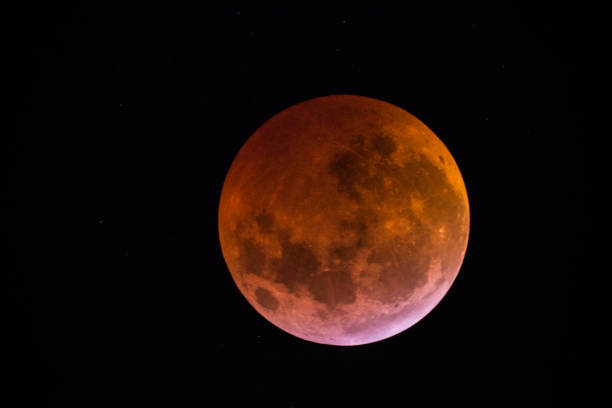 istock View of the Lunar eclipse trough a telescope from Buenos Aires, Argentina. 1097620228