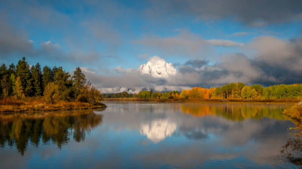 istock Oxbow Bend in the fall with cloud cover on the Teton Mountain Range 1097621850