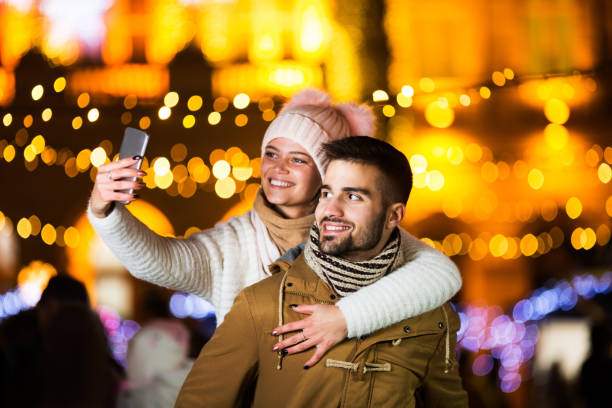 istock Young couple taking a selfie 1097624528
