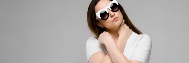 istock Attractive overweight woman in sunglasses 1097630700