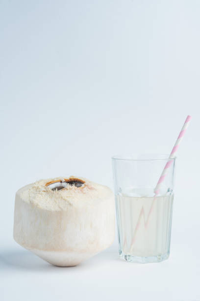 istock Fresh coconut and coconut milk in trasparent glass. 1097630958