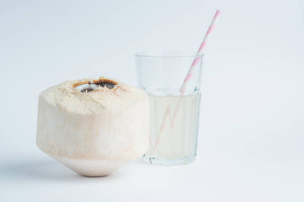 istock Fresh coconut and coconut milk in trasparent glass. 1097630960