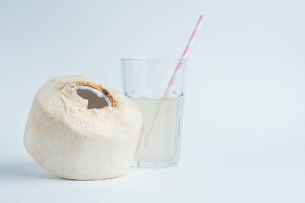 istock Fresh coconut and coconut milk in trasparent glass. 1097630984