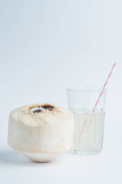 istock Fresh coconut and coconut milk in trasparent glass. 1097631512