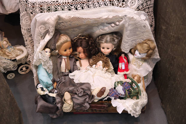 istock Various vintage dolls on the flea market 1097634720