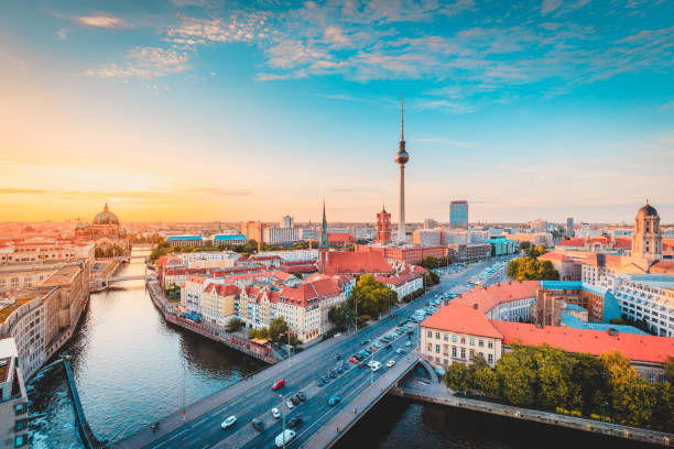 Berlin skyline with Spree river at sunset, Germany Classic view of Berlin skyline with famous TV tower and Spree in beautiful golden evening light at sunset, central Berlin Mitte, Germany spree river photos stock pictures, royalty-free photos & images