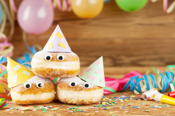 Carnival background with party decoration and cake