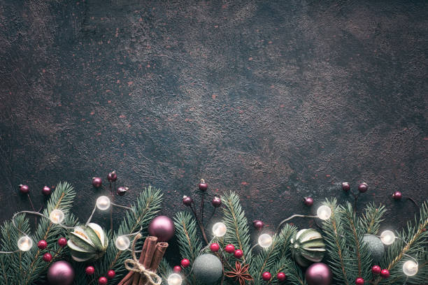 istock Flat lay with fir twigs, lights and Christmas decorations on dark background, text space 1097639440