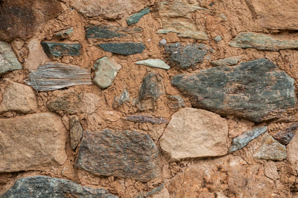 istock Old grunge rural stone wall 1097639550
