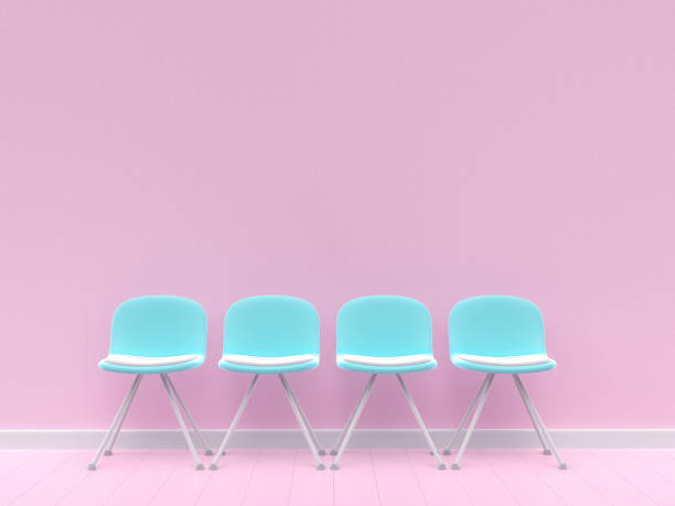 istock Four blue chairs on concrete wall pink pastel color 1097642382
