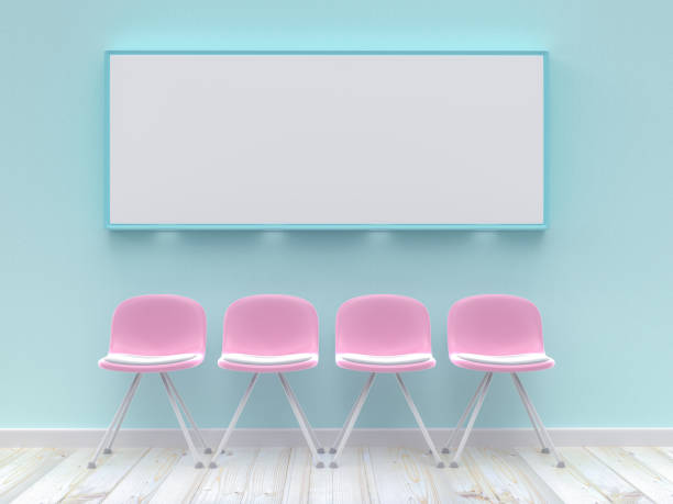 istock Four pink chairs with blank poster mockup on concrete wall 1097642436