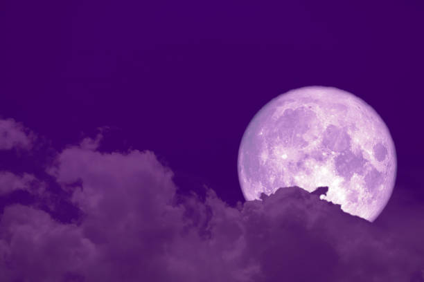 istock hunger moon back on silhouette heap cloud on sunset sky 1097644882