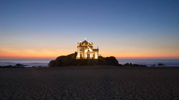 istock Church in the beach at blue hour 1097648300