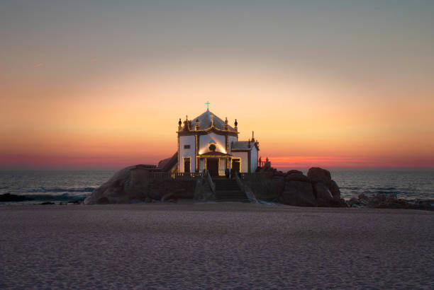 istock sunset over the church in the beach 1097648366