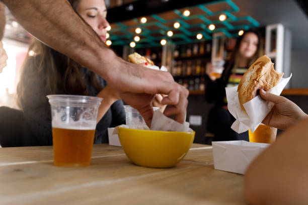 istock Coworkers enjoying happy hour at pub 1097660470