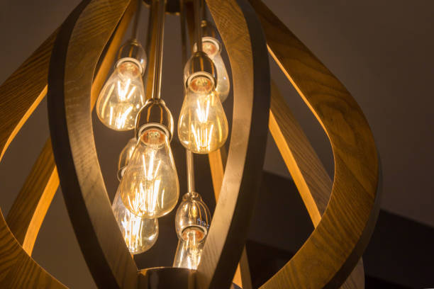 istock Warm tone light bulb lamp.decorative with wall room yellow. 1097666308