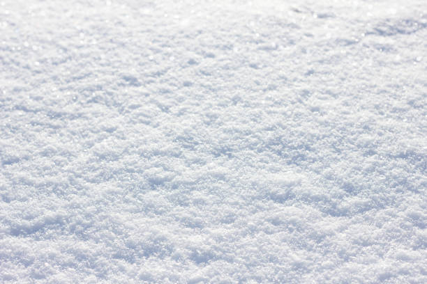 istock snow texture in a sunny day 1097666988