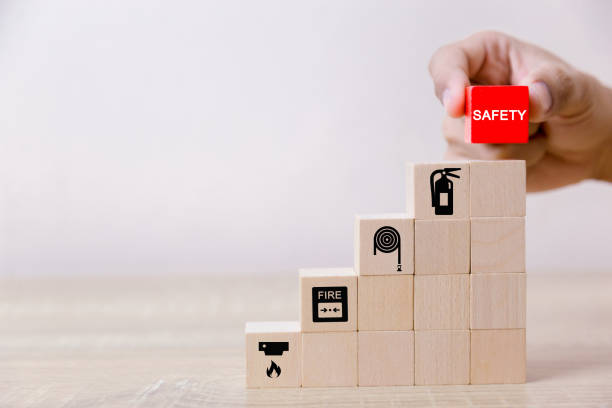 istock Place the wooden blocks into steps. 100 percent work safety concept. 1097673712