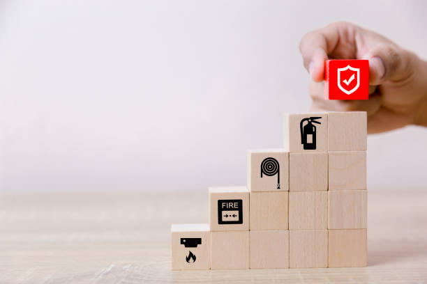 istock Place the wooden blocks into steps. 100 percent work safety concept. 1097673838