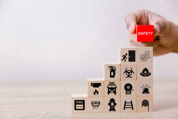 istock Place the wooden blocks into steps. 100 percent work safety concept. 1097674034