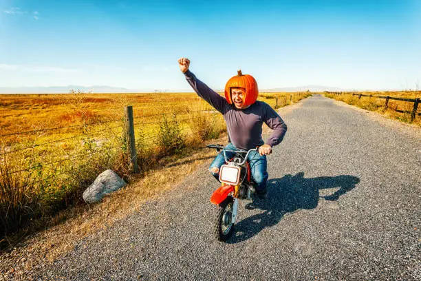 Photo of Pumpkin Helmet Motorcycle Racer