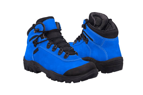 istock A pair of hiking color  boots. Isolated on white background - Imagem 1097678708