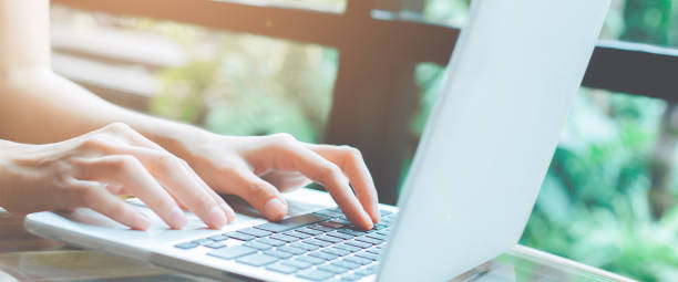 istock Business woman hand working with a laptop computer in the office. 1097687288