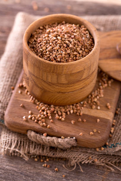istock buckwheat groats on wooden surface 1097690572