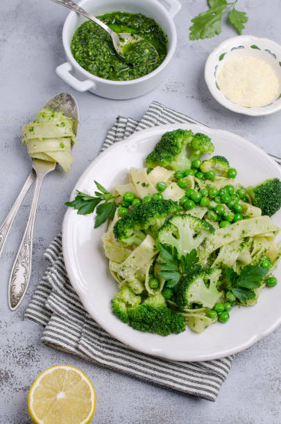 istock Traditional Italian pasta with green vegetables 1097692012