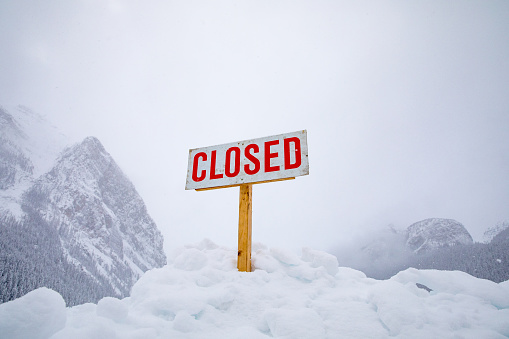 Closed sign in the snow