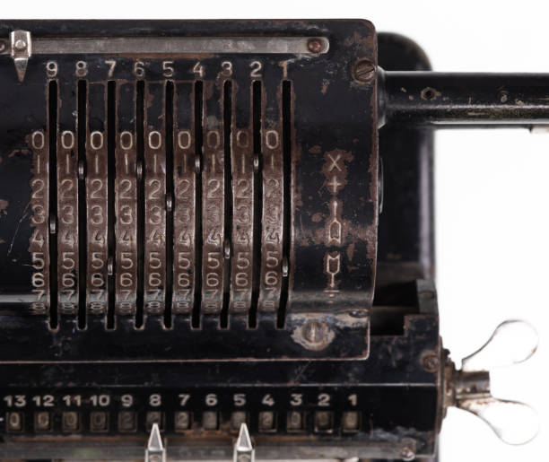 istock old mechanical calculator,metal digital font 1097700240