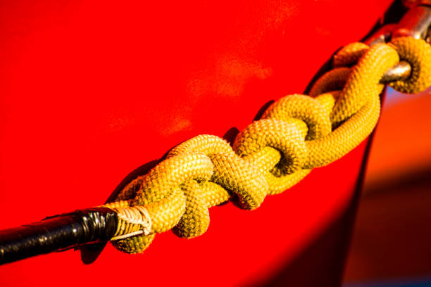 istock Mooring line of a trawler with knots 1097712874