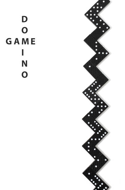 istock Black dominoes on white background with copy space 1097715932
