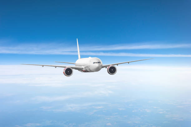 istock Passenger plane flies in the sky, performing flight. 1097720874