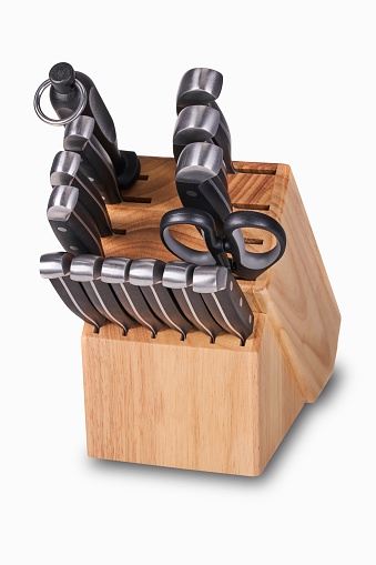 Kitchen knife set: in wood Kitchen block on white backgound