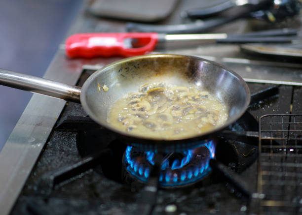 istock Chef cooking food in the kitchen, Chef preparing food 1097724740