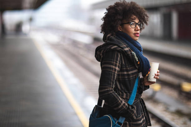 istock Young woman waiting for the train 1097725290