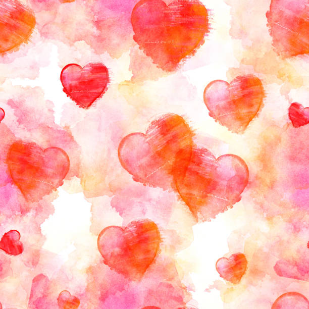 istock A seamless pattern of red watercolor hearts on a romantic pastel pink background, a Valentine day repeat print 1097726116