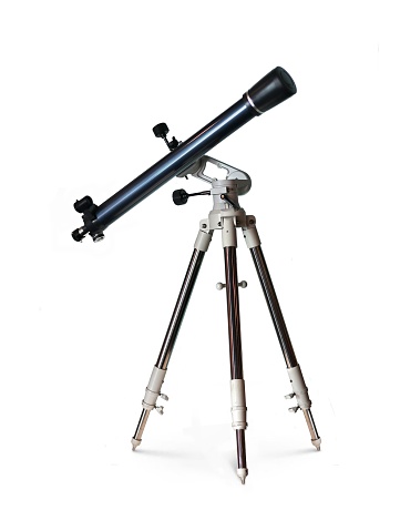Telescope standing on tripod over white background