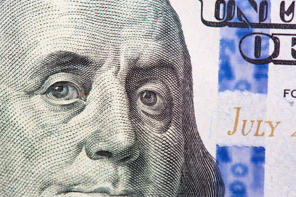 istock Benjamin Franklin on us one hundred dollar bill macro. 1097728666