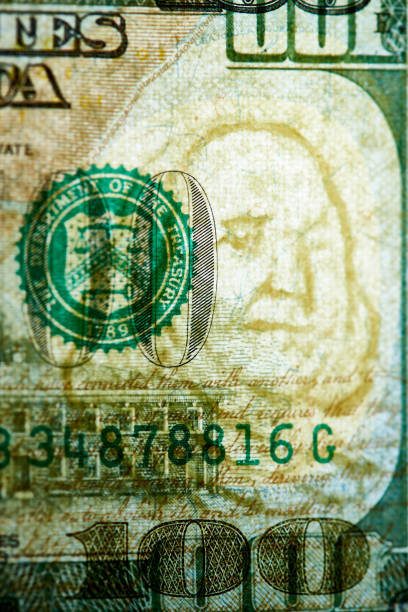 istock Authentication of banknote  one hundred dollars on clearance. Watermarks on one hundred dollar bill. 1097728864