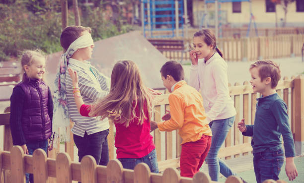 istock Children playing outdoors 1097733172
