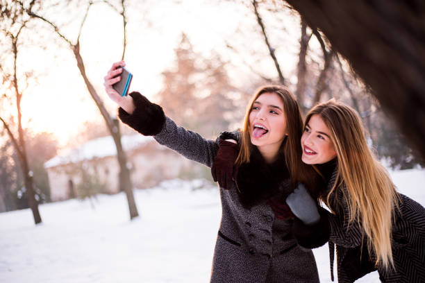 istock Girls Taking Selfie 1097745388