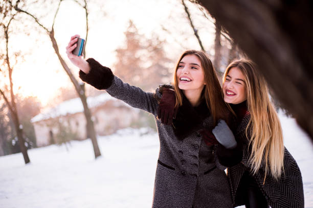 istock Girls Taking Selfie 1097745416