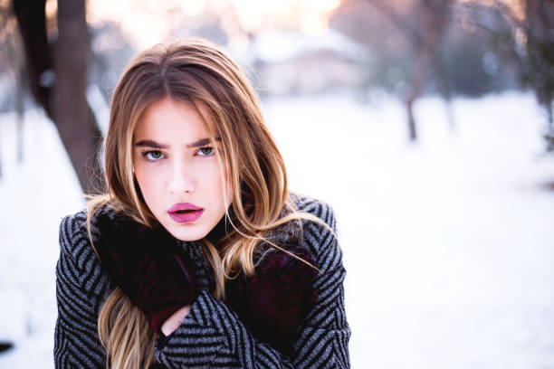 istock Girl In Snow 1097746472