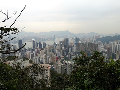 Hong Kong cityscape under cloudy sky, viewed from Mount Cameron, Hong Kong island.